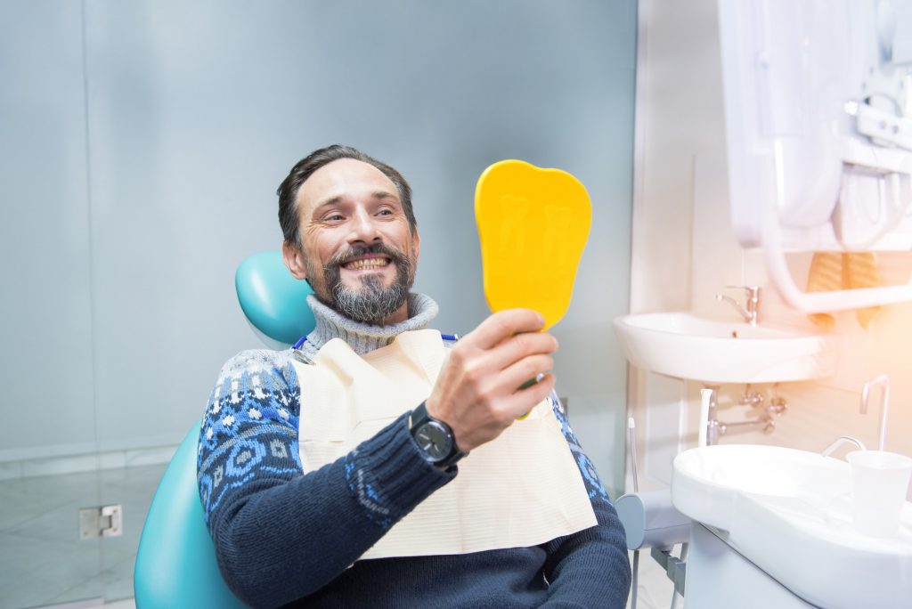 Happy Patient on our Dental Chair